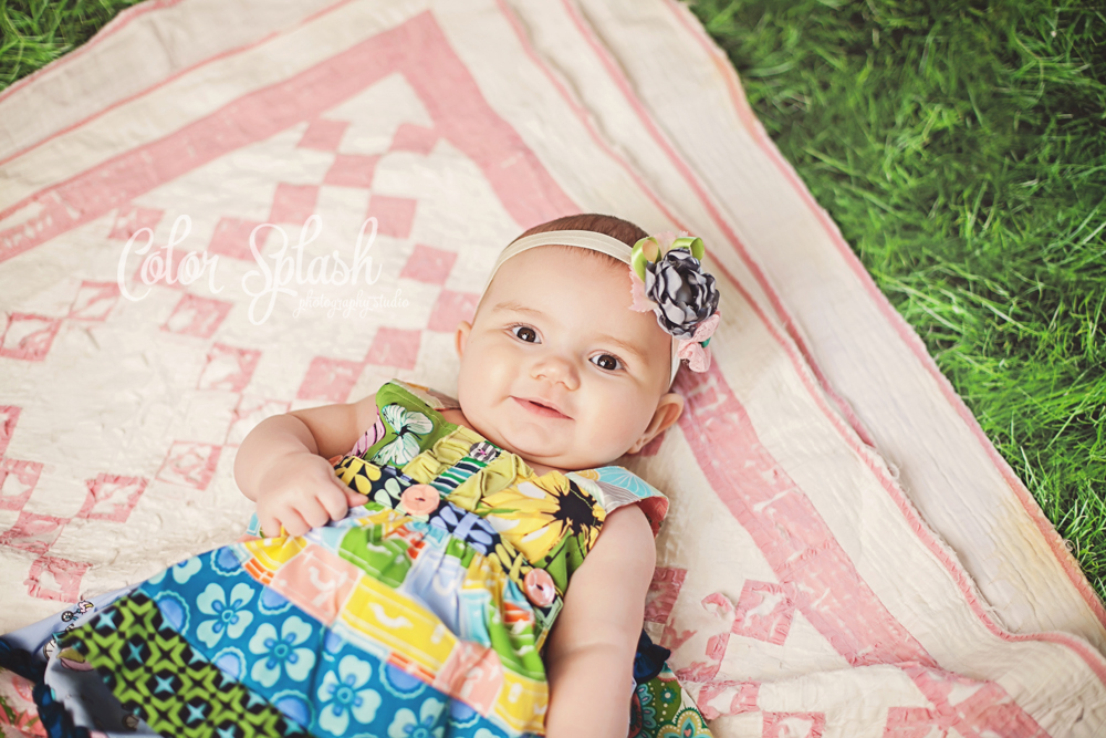 baby on quilt photo